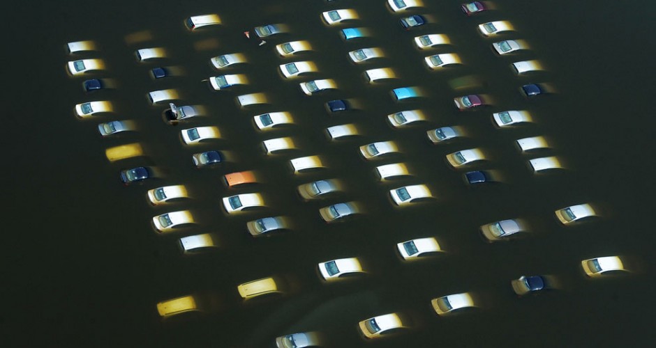 Cars submerged at a Honda car factory (Christophe Archambault / AFP / Getty Images)